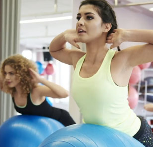 women exercising with stability balls