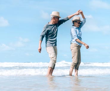 couple dancing on a beach